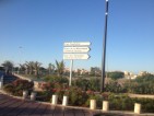 Signpost showing island name