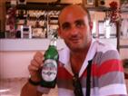 Oscar Luis and the beer.
