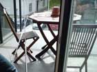 Antenna is being put together on the balcony.