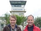 Team photo in front of Kuresaare airport traffic control tower.